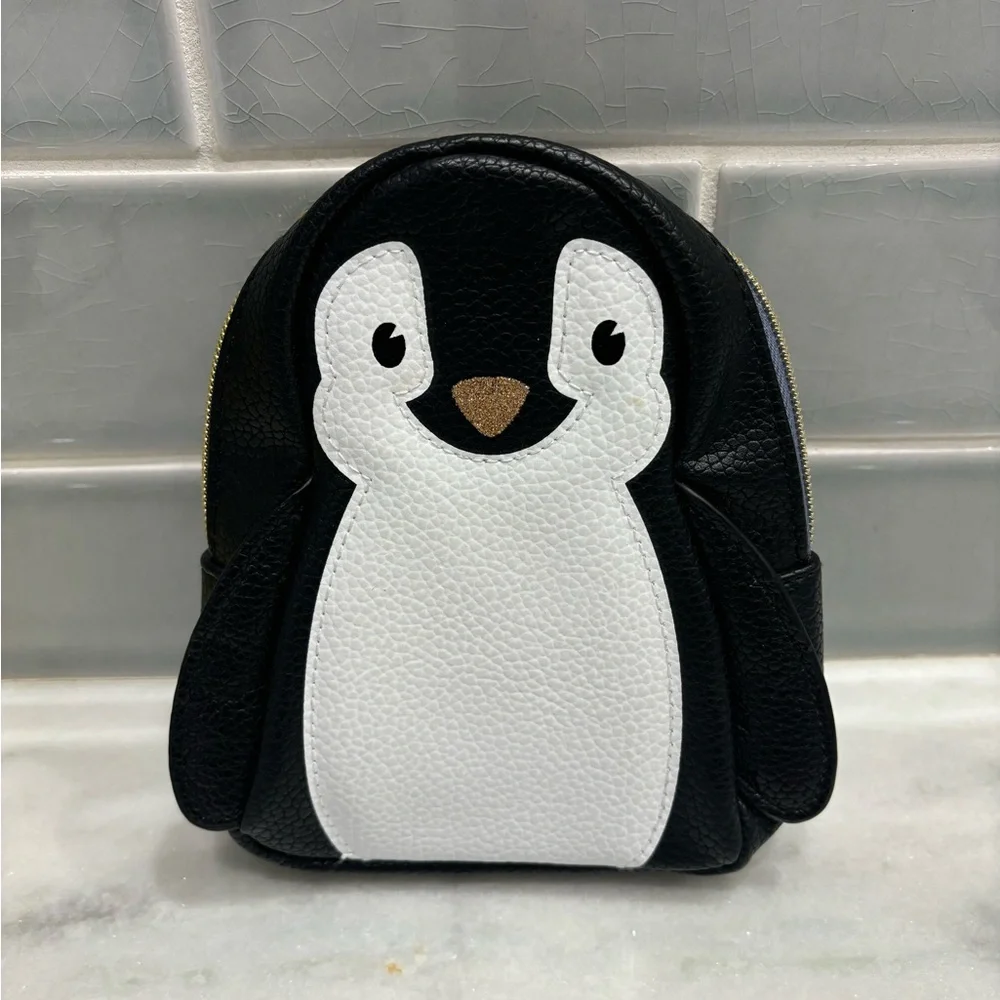 Bath & Body Works penguin cosmetic bag in black and white faux leather